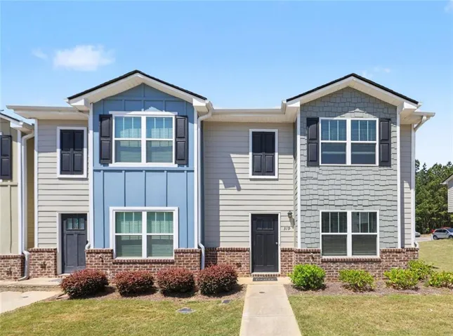 End Unit Townhome Exterior With Clean Design And Private Setting