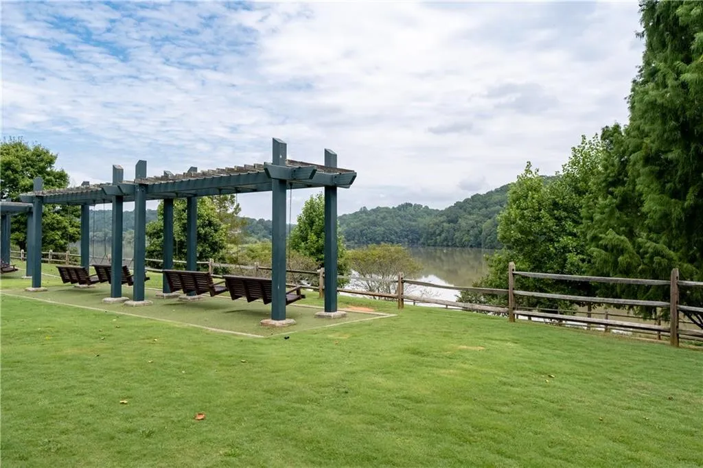 Imagine sitting on a porch swing and watching the sunset at Morgans Fall Overlook Park featuring a water view and pergola. An ideal escape from the hustle and bustle of a busy life.