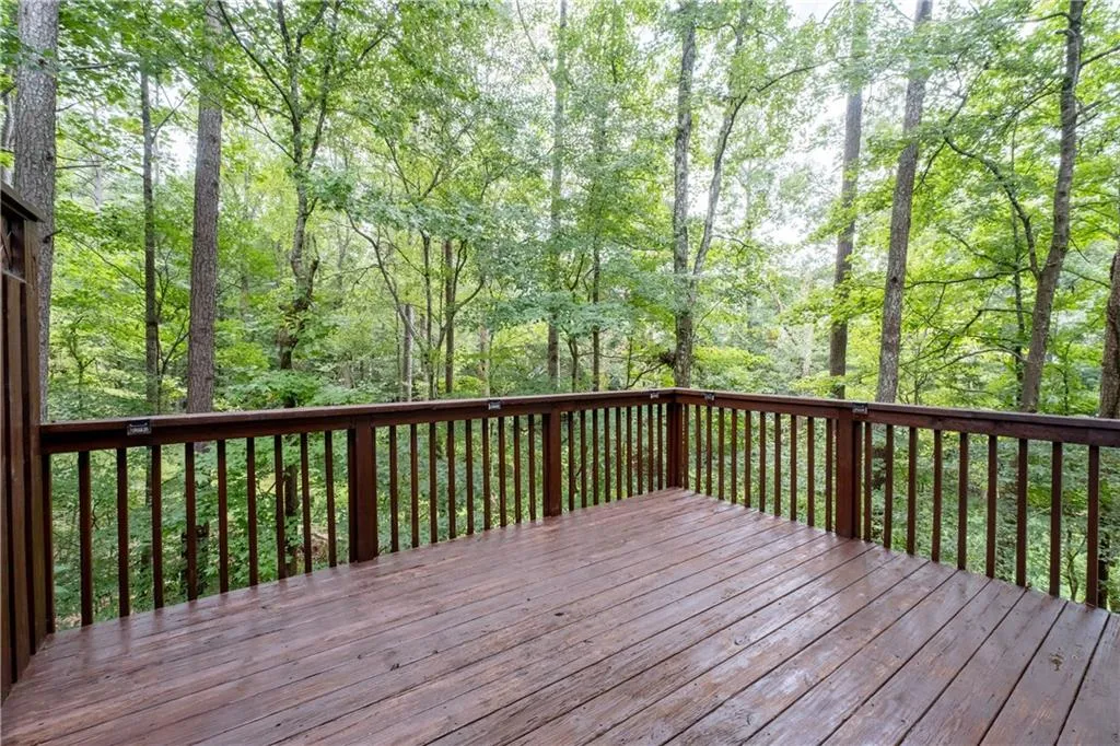 Sitting on your private deck listening to the birds. This space is ready for your outdoor dining or cookout needs, and planters filled with flowers, herbs or small vegetables.