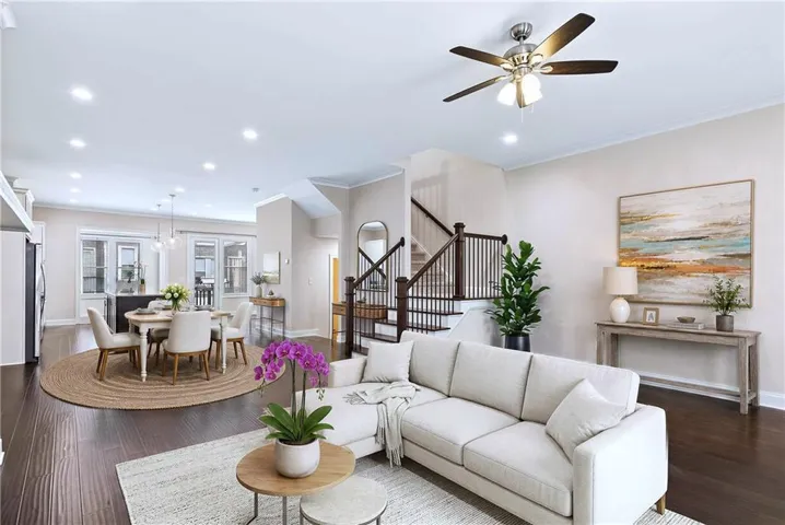 Spacious interior featuring dark wood-finish flooring and light-toned walls