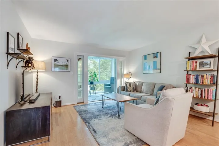 Beautiful living room with nice natural light from the sunroom