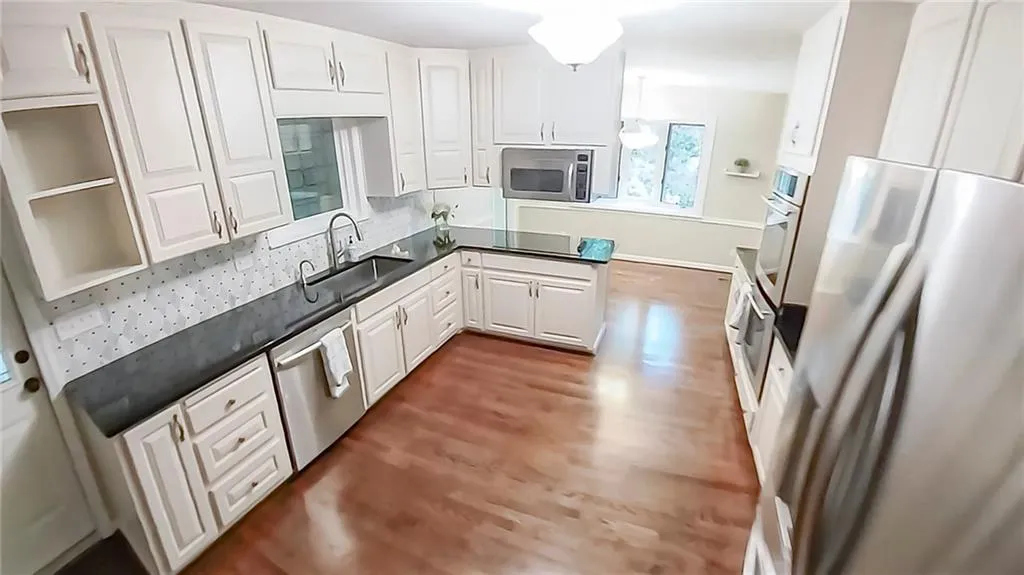 5735 Riverwood Drive, Atlanta, Georgia 30328, 4 Bedrooms Bedrooms, ,3 BathroomsBathrooms,Residential,For Sale,5735 Riverwood Drive,7656382