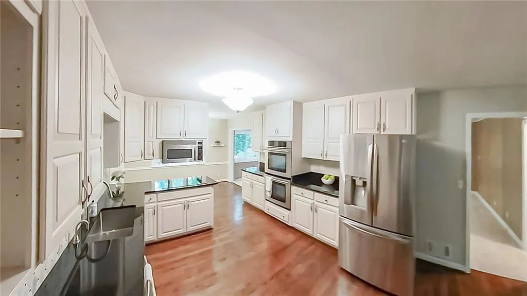 5735 Riverwood Drive, Atlanta, Georgia 30328, 4 Bedrooms Bedrooms, ,3 BathroomsBathrooms,Residential,For Sale,5735 Riverwood Drive,7656382