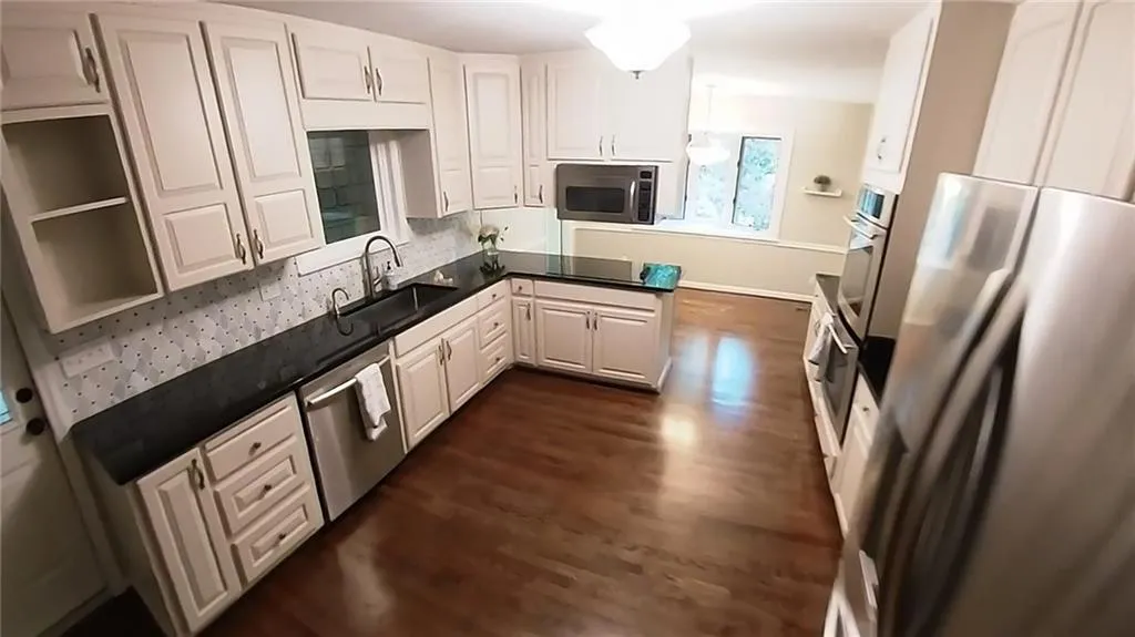5735 Riverwood Drive, Atlanta, Georgia 30328, 4 Bedrooms Bedrooms, ,3 BathroomsBathrooms,Residential,For Sale,5735 Riverwood Drive,7656382