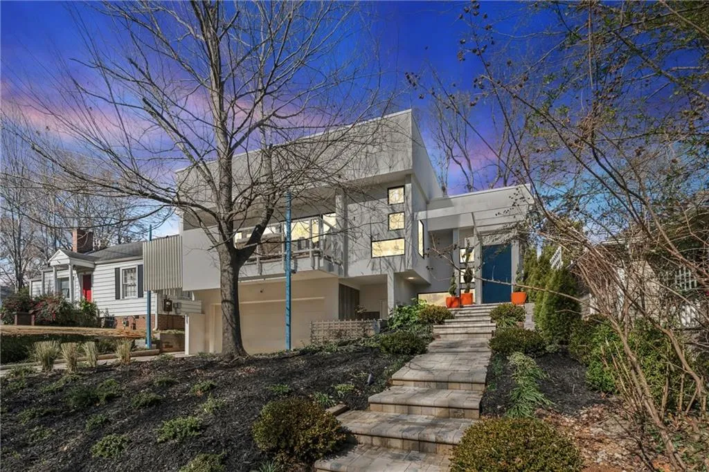 As you walk up the main path from the street, you'll notice the front patio above the garage - it offers some amazing views and fantastic privacy.