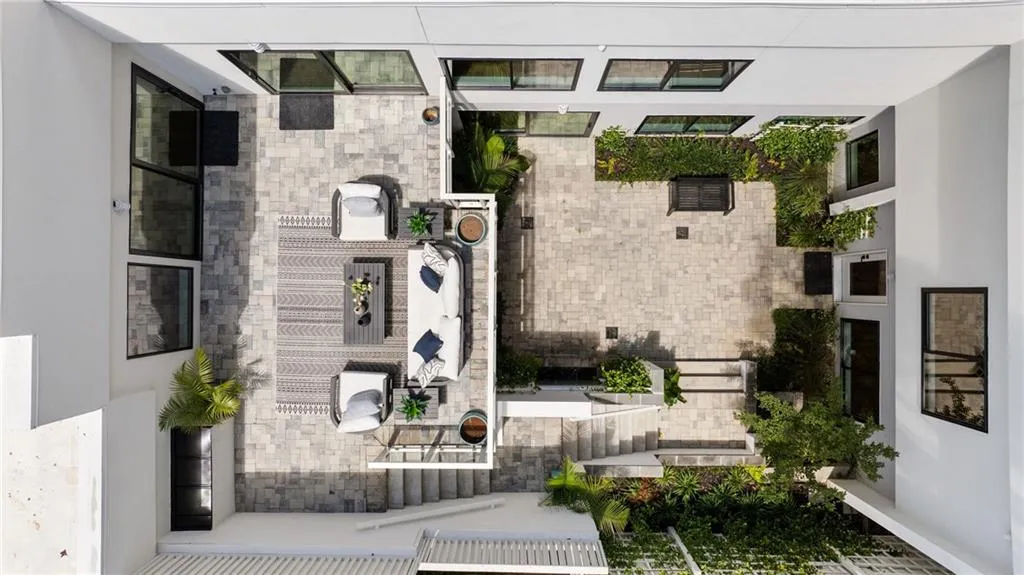 The entire house is centered around this incredible central courtyard with upper and lower levels. You have to see it to really understand how incredible this is for an urban home!