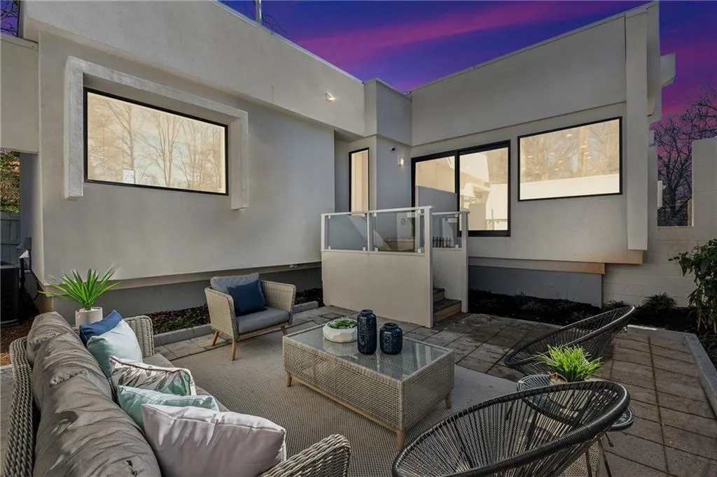 virtual twilight of the rear yard/patio