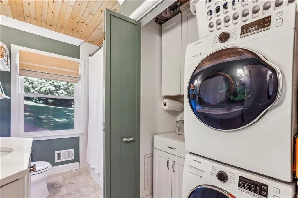 Relocated laundry in larger full bathroom