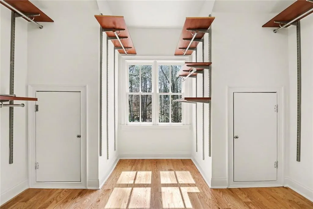 One of Two Walk-In Closets in Primary Suite