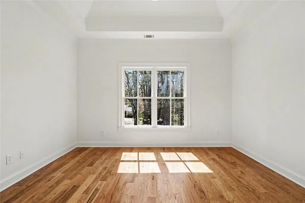 Bedroom with Vaulted Trey Ceiling