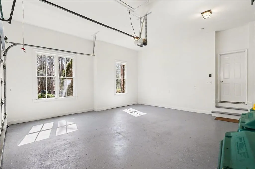 Oversized Garage with Soaring Ceilings & Storage Area
