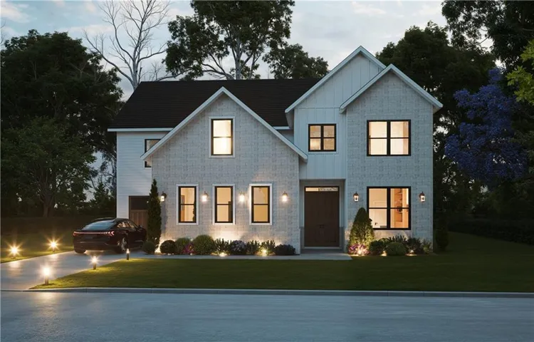 Two-story residence featuring a mix of vertical siding and textured stone-look panels