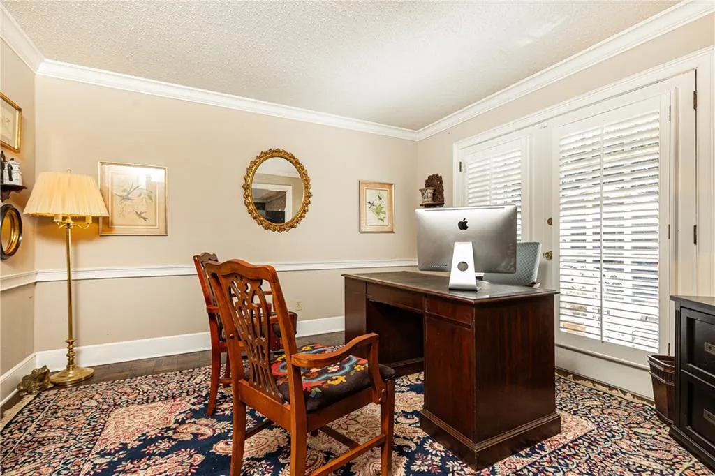 Sophisticated office space with french doors to the beautiful back yard.