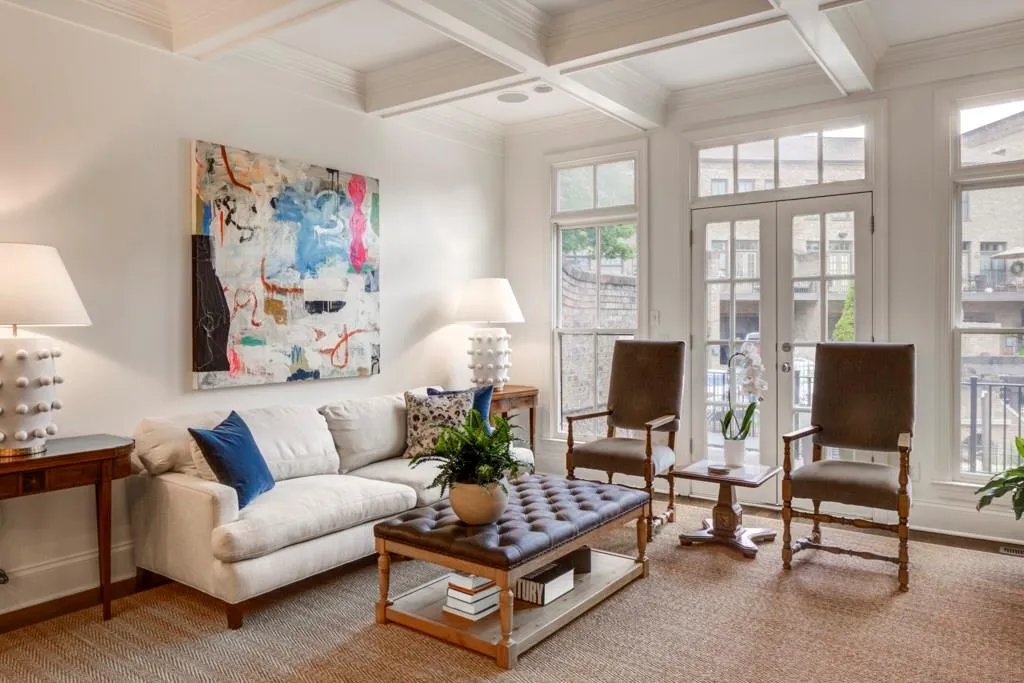 with french doors leading out to outdoor deck.