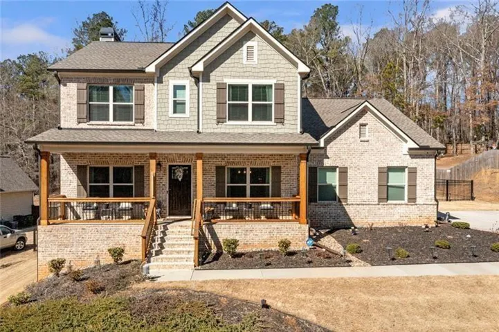 Brick and siding exterior with gabled roof lines