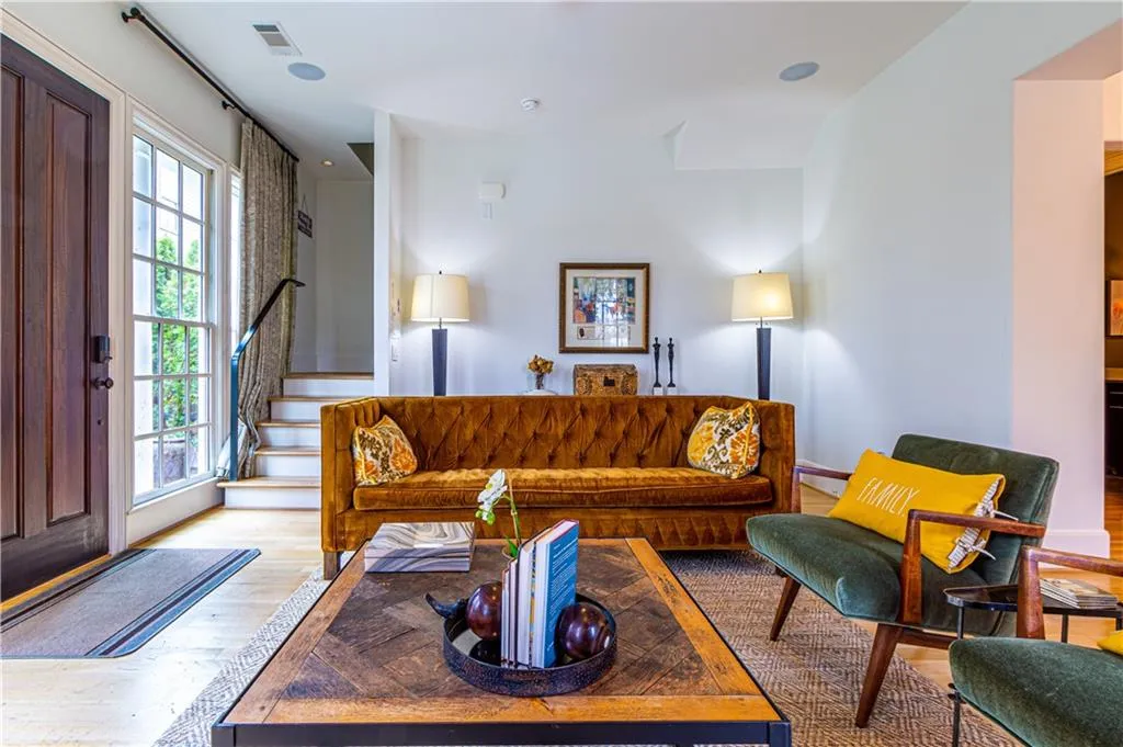 Living room with wood-type flooring