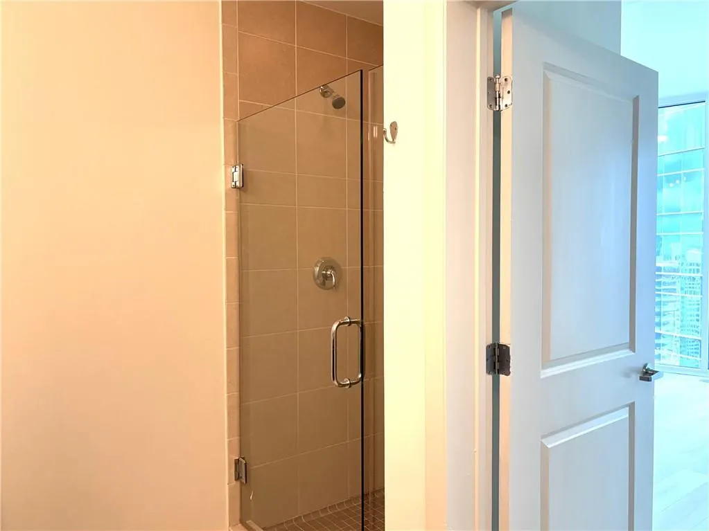 Bathroom with a Walk In shower stall