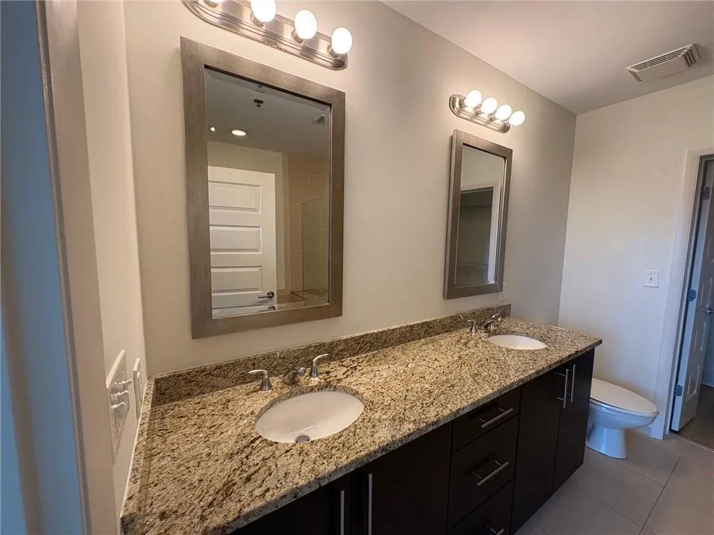 Double Vanities Separate Shower and Bathtub