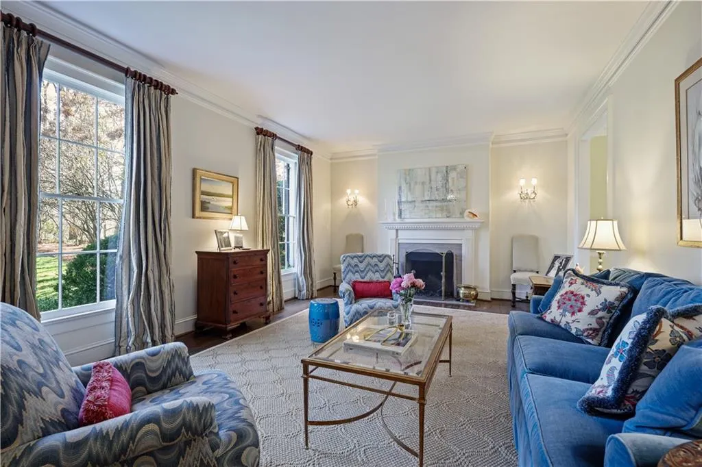 Large formal living room with fireplace.