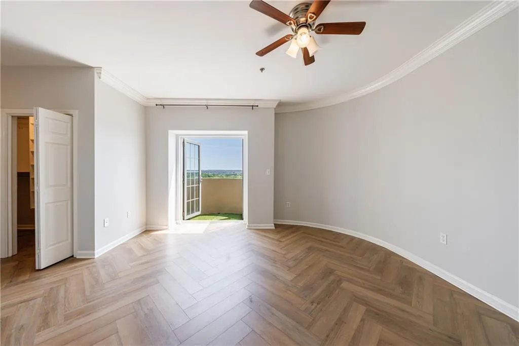 Spacious primary suite w/ private balcony access