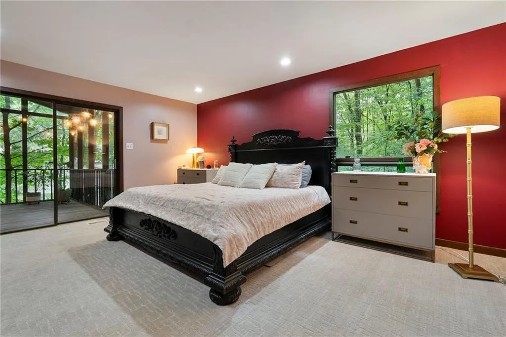 Primary Bedroom has direct access to screen porch