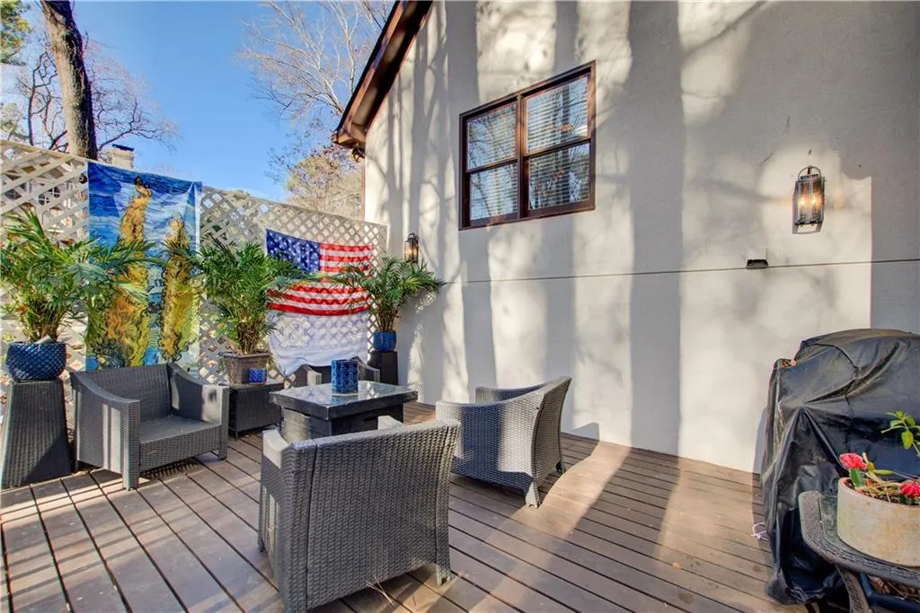 Wooden terrace with an outdoor fire pit