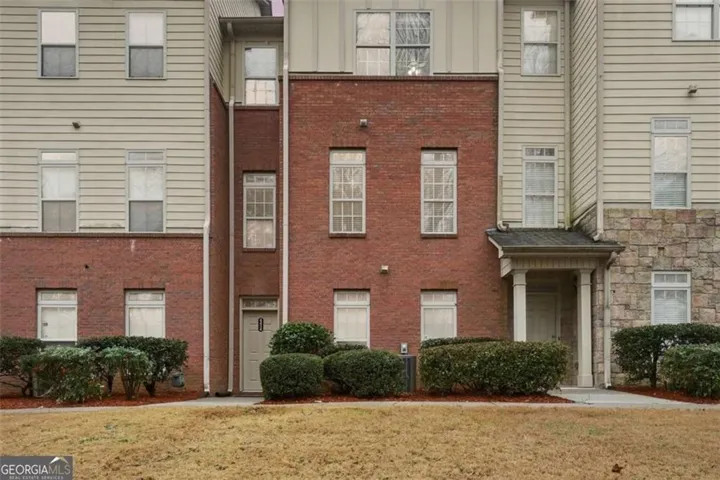 Brick and siding exterior with stone accents