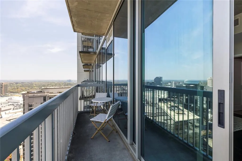 Balcony featuring a view of city