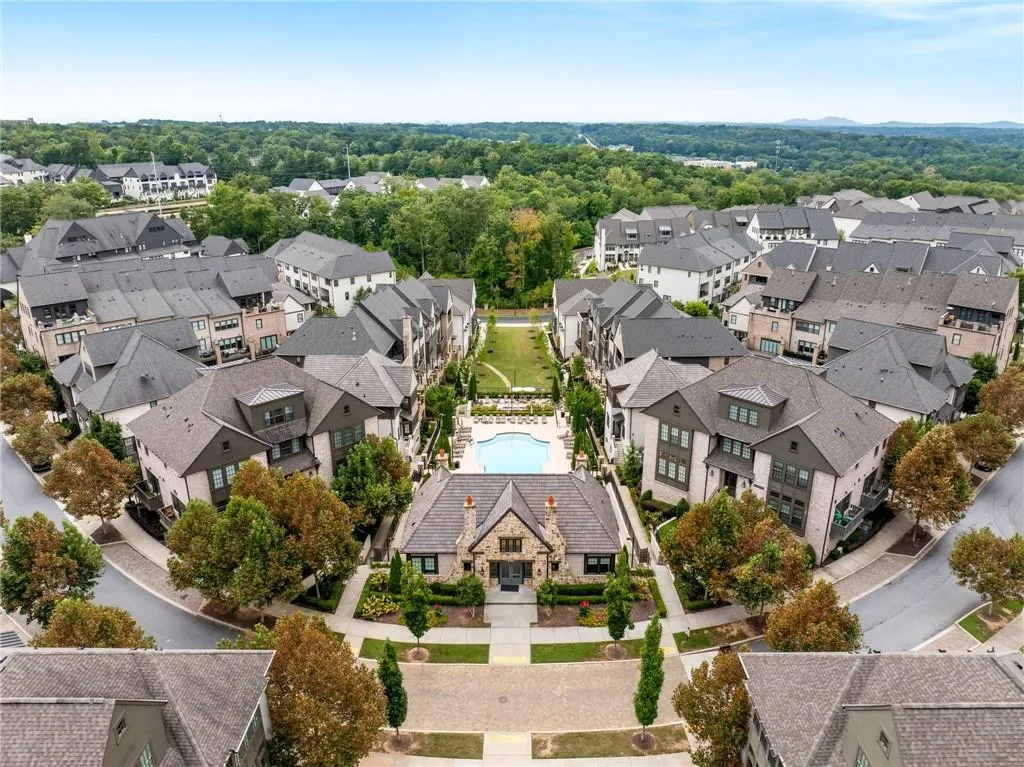 Birds eye view of property with a residential view