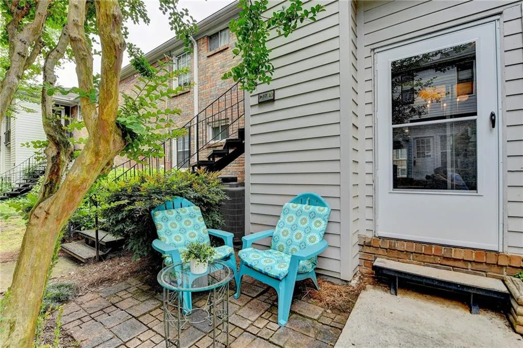 View of patio featuring stairs
