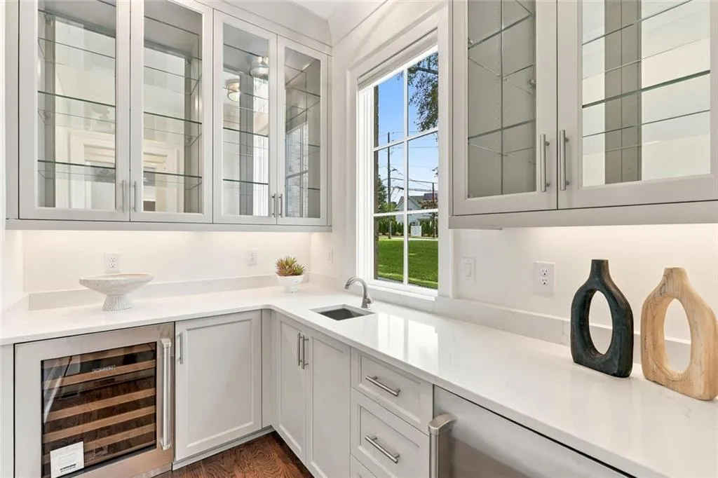 Full Wet Bar with Sub-Zero wine chiller and beverage refrigerator