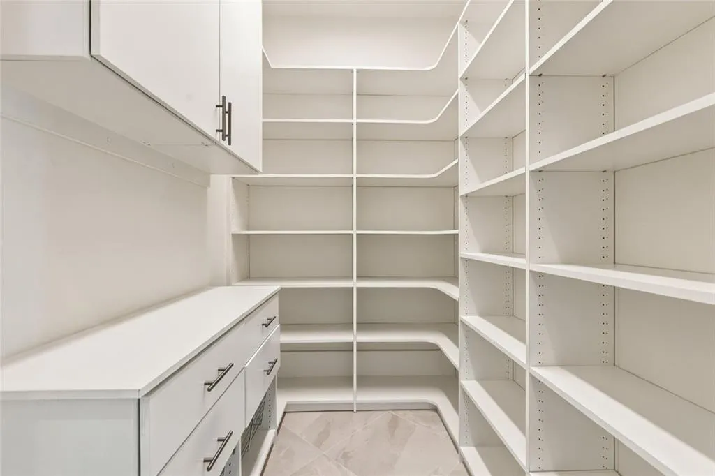 Kitchen Pantry located conveniently to the Garage and Side Entry