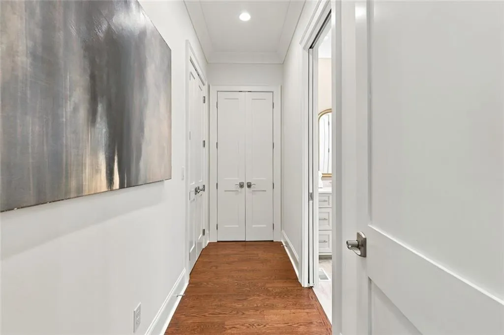 Hall to Primary Bathroom, His Closed on the left