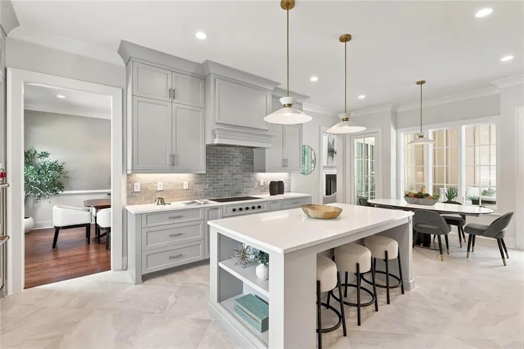 Kitchen opening to Formal Dining Room and Great Room on the far end