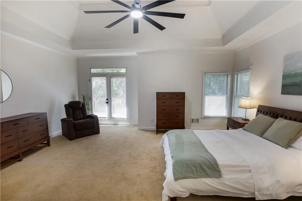 Opens to private backyard deck.