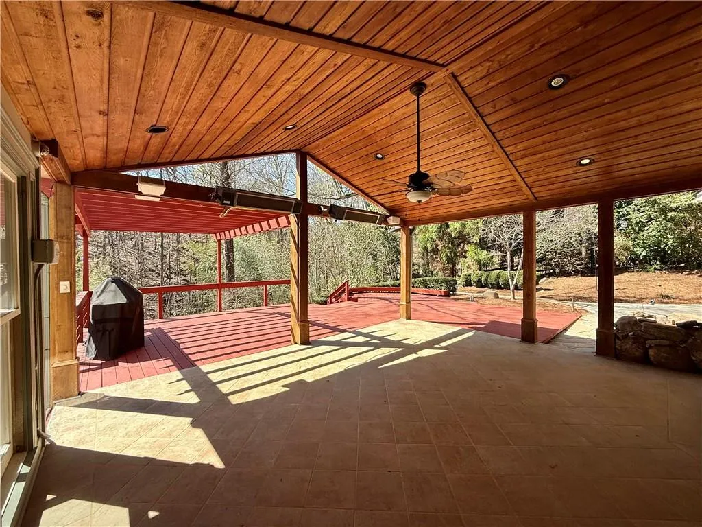 This covered and tiled patio will be one of your favorite places to relax and take in the serene setting listening to the sounds of the waterfall.