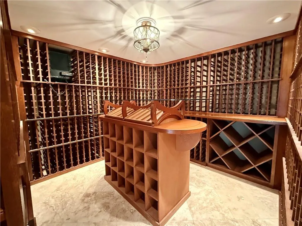 This 5,000 bottle wine cellar is 1 of only 2 created by the designer.