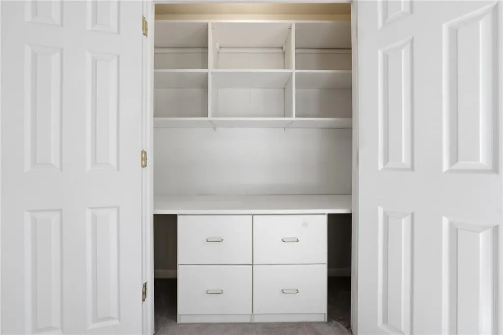 Bedroom 1's Closet with California Closet System