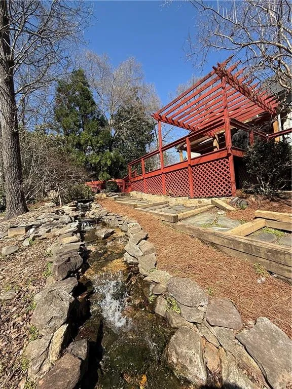View from the waterfall to the back of the home