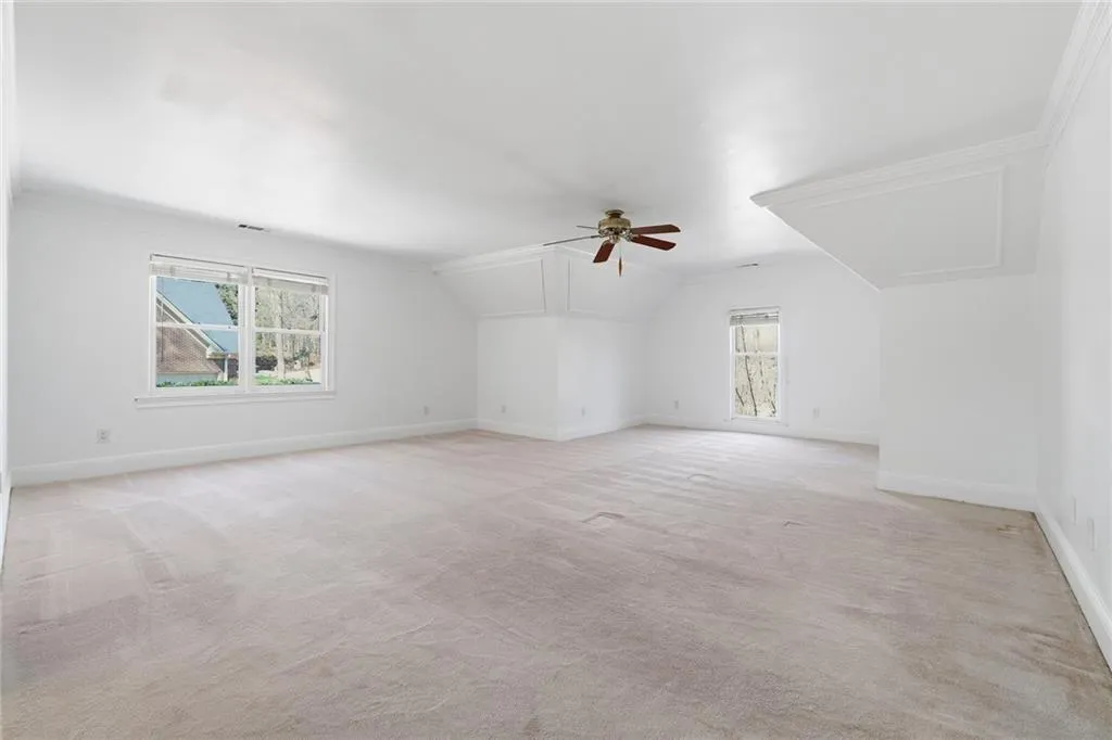 The Master Bedroom is huge with plush luxury carpet. There is room for a California King, a large bedroom suite and a sitting area if you were so inclined!