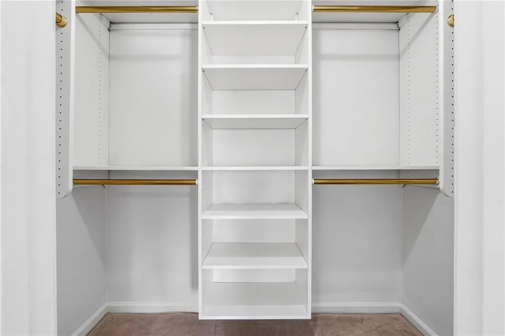 Bedroom 1's Closet with California Closet System