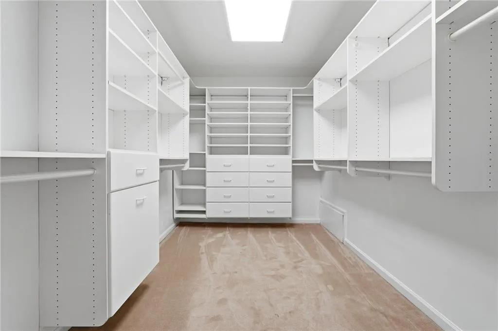 The Master Bedroom's HUGE walk-in closet with California Closet built-ins.
