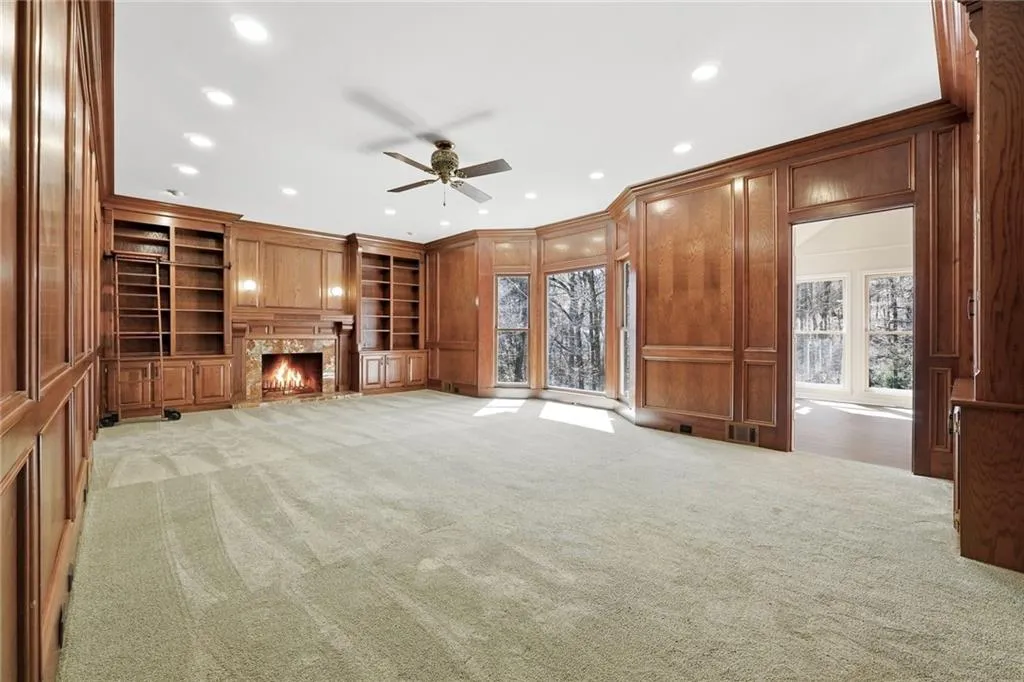 The wood paneling in this Great Room is flawless and quietly whispers luxury.