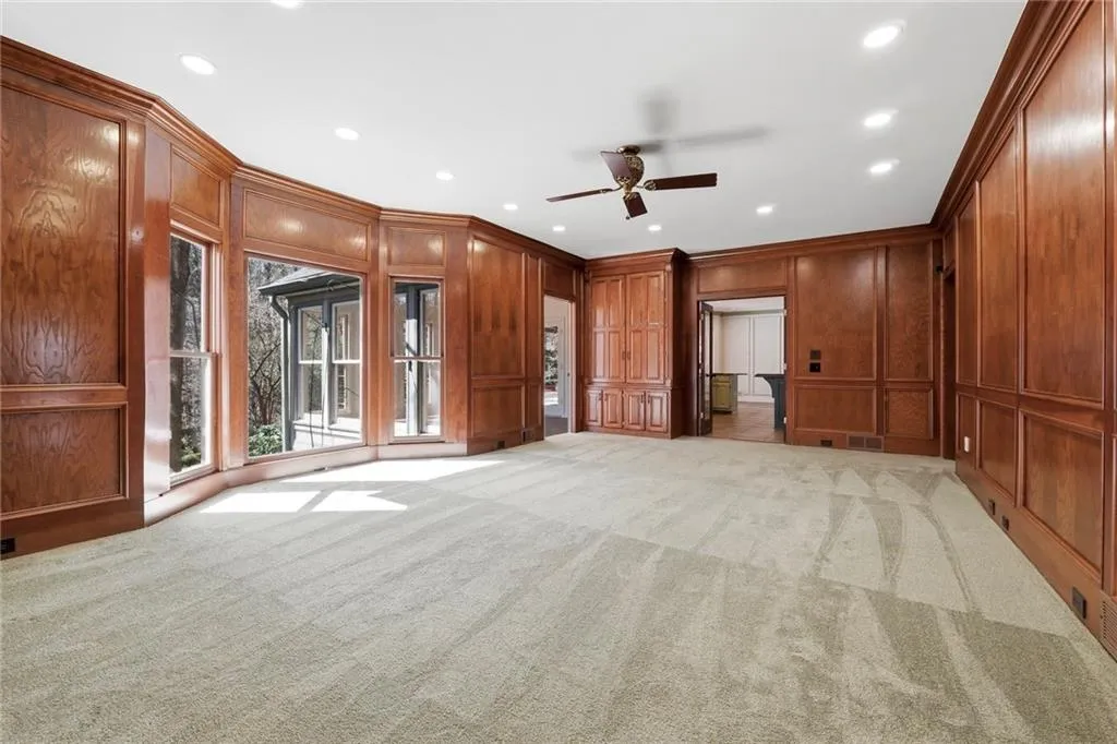 Last photo of the great room, and here you can see the bay windows overlooking the nature in your backyard.