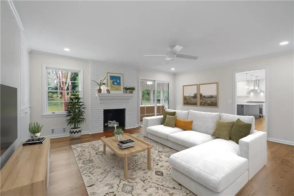 Direct access to the sunroom. Virtually staged.