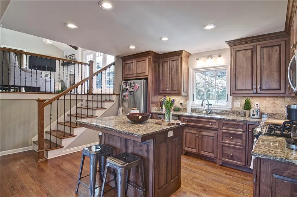 Keeping Room Overlooks Kitchen and Dining
