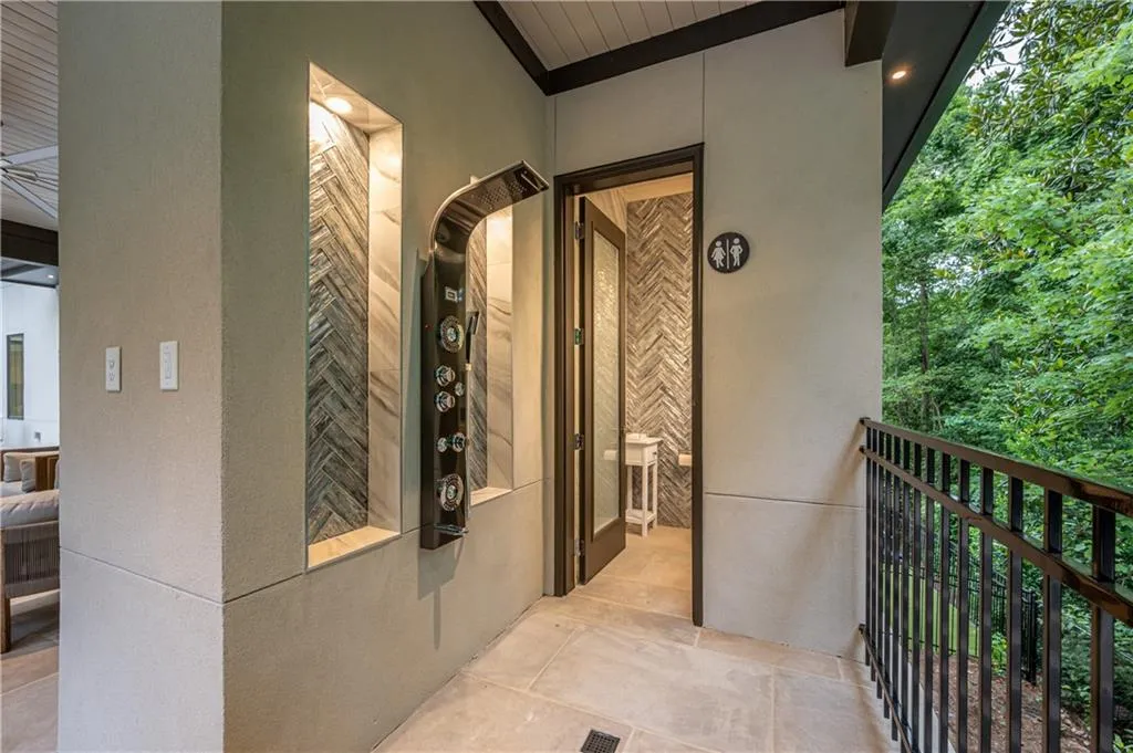 Outdoor shower with heated half bath