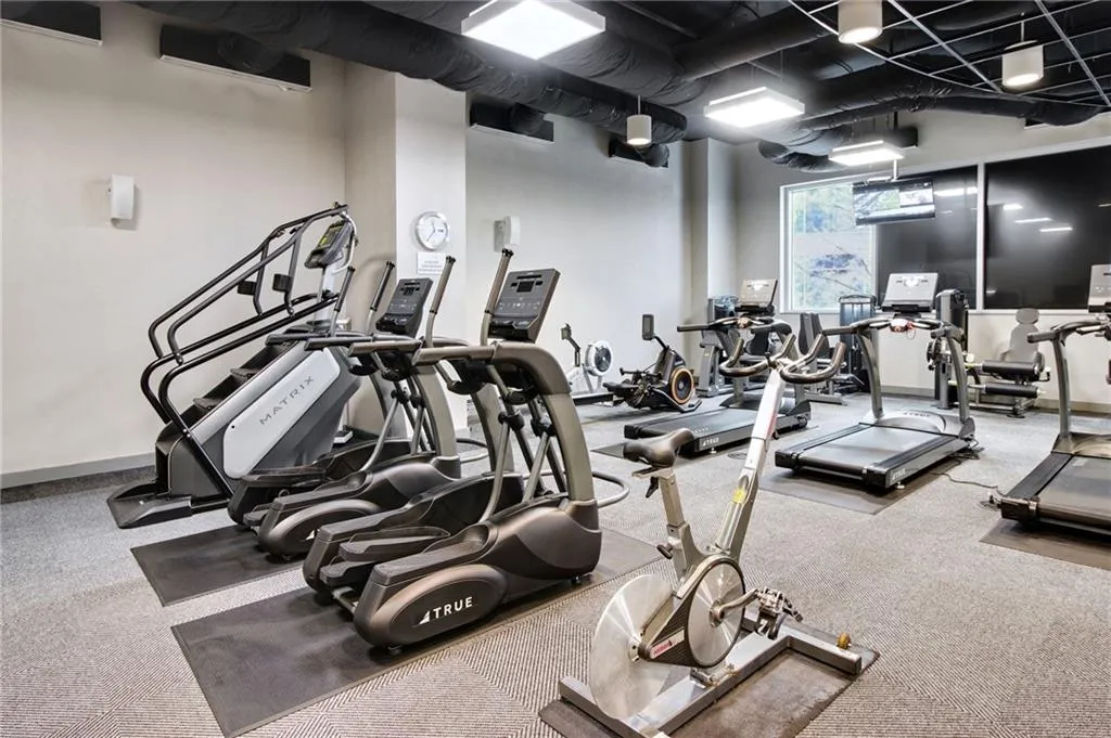 Workout area featuring carpet flooring