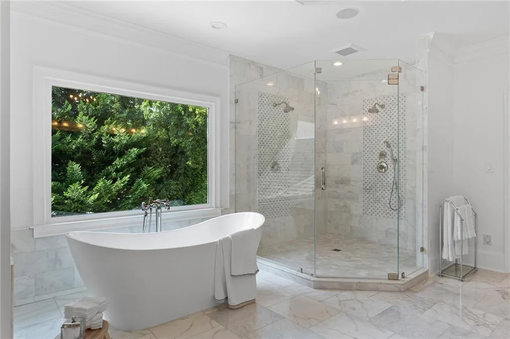Bathroom with crown molding, tile flooring, and independent shower and bath