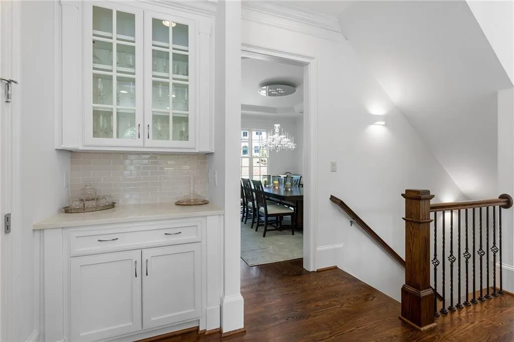 Hallway with dark wood-type flooring